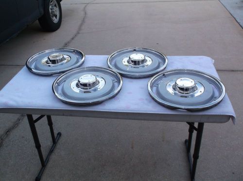 1963 corvette hubcaps,(frosted),including spinners and ribs