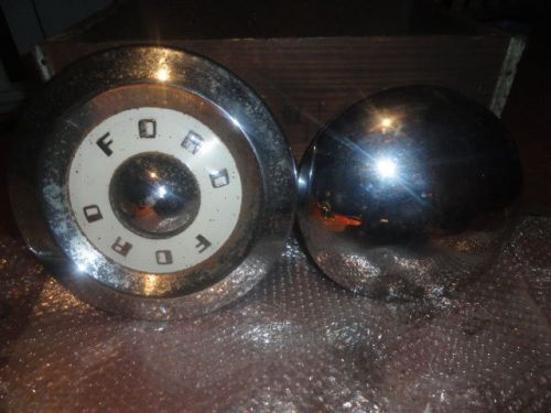 (2) vintage ford hub cap - (1) flat white with ford name, (1) basic round
