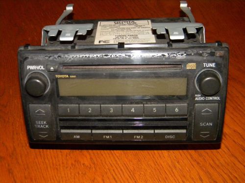 Toyota camry factory radio cd player with mounting brackets part #86120-aa160