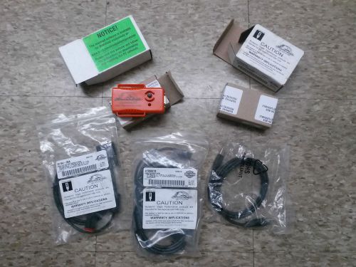 Two brand new screaming eagle tuner p/n :41000008b with 2 cable kits