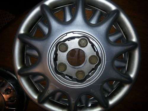 &#039;97-&#039;05 buick century,lesabre 15&#034;, used hubcaps  9592348,    set of three
