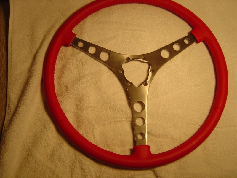Corvette steering wheel, 1956-1962, new, wrapped in 1959-1962 roman red leather