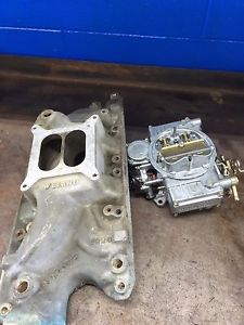 Holley 600 cfm carburetor with weiand aluminum intake