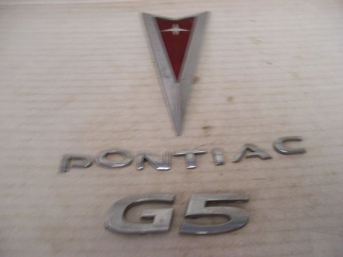 Pontiac g-5 chrome trunk letter red arrow  ornament emblem