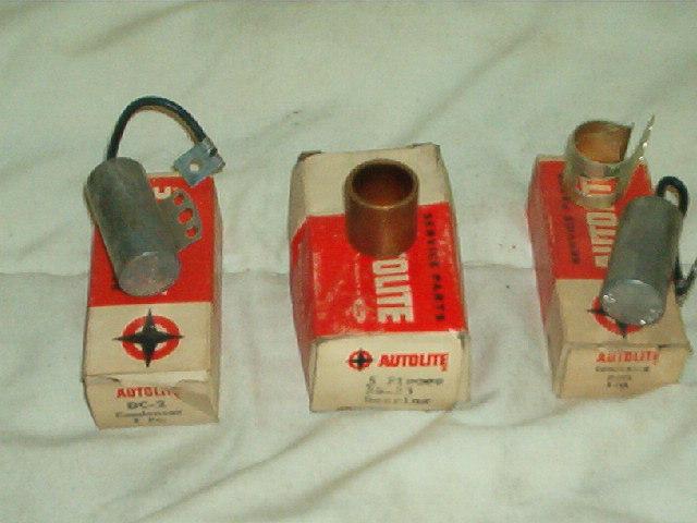 Lot of new autolite star items 2-205 and dc-2 condenser and 24-23 bearing    nos