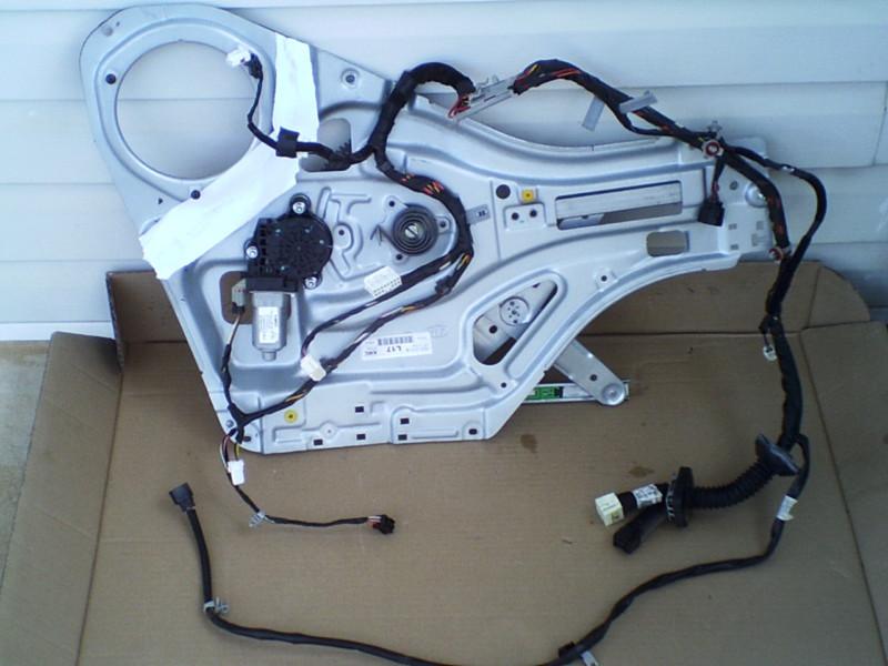 06-07 kia sportage left front window regulator with motor, and wire harness oem