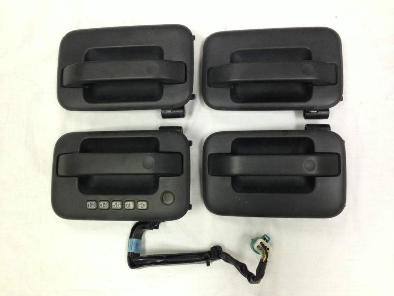 '06 ford f-150 keyless entry door handle & housing set (all 4)
