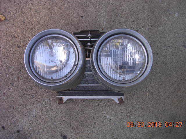 Cadillac  61 1961 left headlight assembly