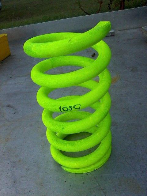 Front spring 1050# 5" dia. 10" height, ground flat one end nascar imca racing
