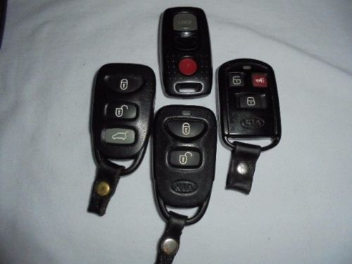 Lot of 4 remote keyless entries for kia and mazda vehicles