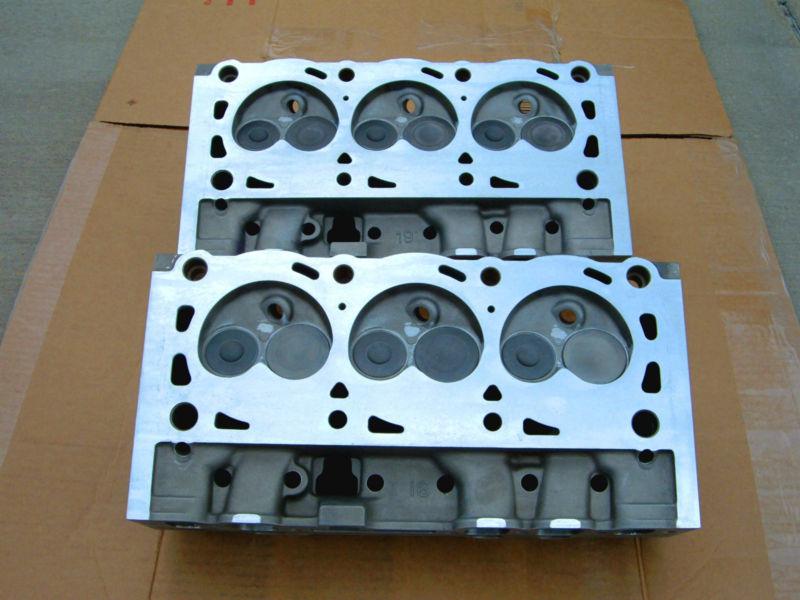 Ford thunderbird super coupe cylinder heads  e9se-6090-d7a  
