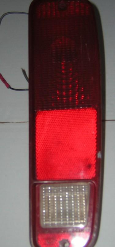 Ford - tail light - part number d4tb-13404-aa  rh 