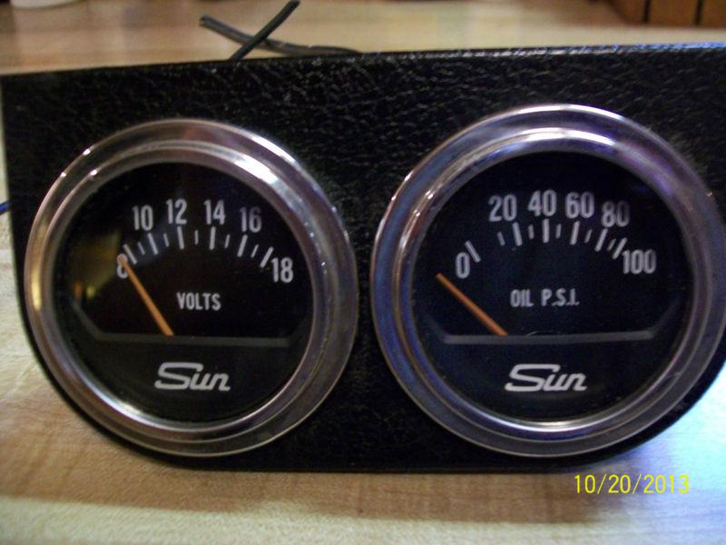 Sun oil & volt,  lighted 2" dia. gauges mounted in under dash bracket - nice !!!