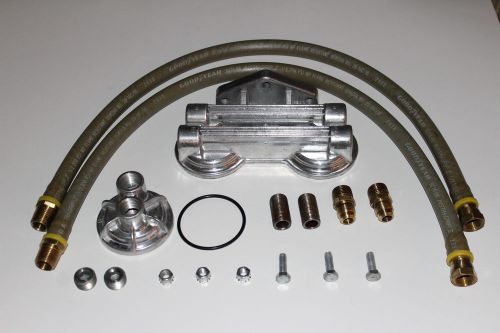 Trans-dapt dual oil filtr relocation,honda,chevy,dodge,ford,mazda,jeep,nissanetc