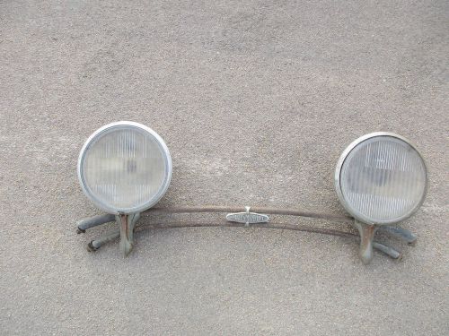 1910 - 1920s oldsmobile headlights with lenses and bar with logo original