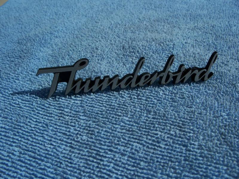 78 79 thunderbird headlight door script emblem 77 78 79 dash script emblem