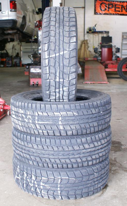 Like new 185/70r14 cooper weathermaster graspicd ds-1 winter tires