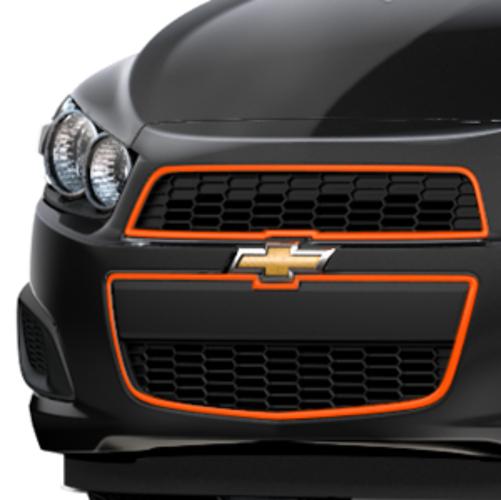 12-14 chevrolet sonic  grille black w/inferno orange outline by gm 95942043