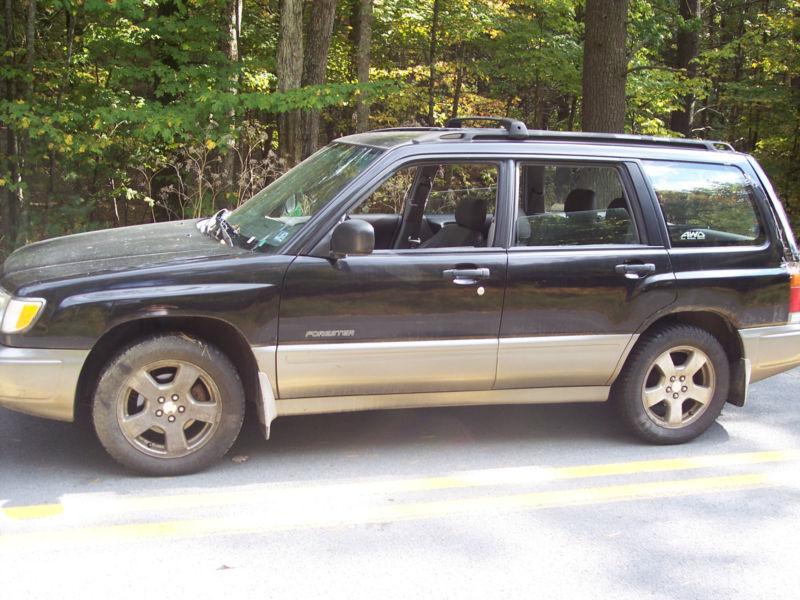 1999 subaru forester, 5 speed, 2.5 eng, damaged, clean papers. no reserve!! nr