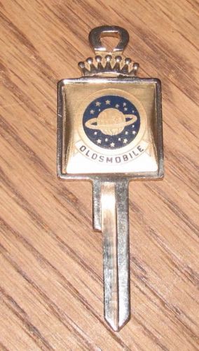 Vintage oldsmobile yellow gold crest key new old stock,never cut...no reserve.!