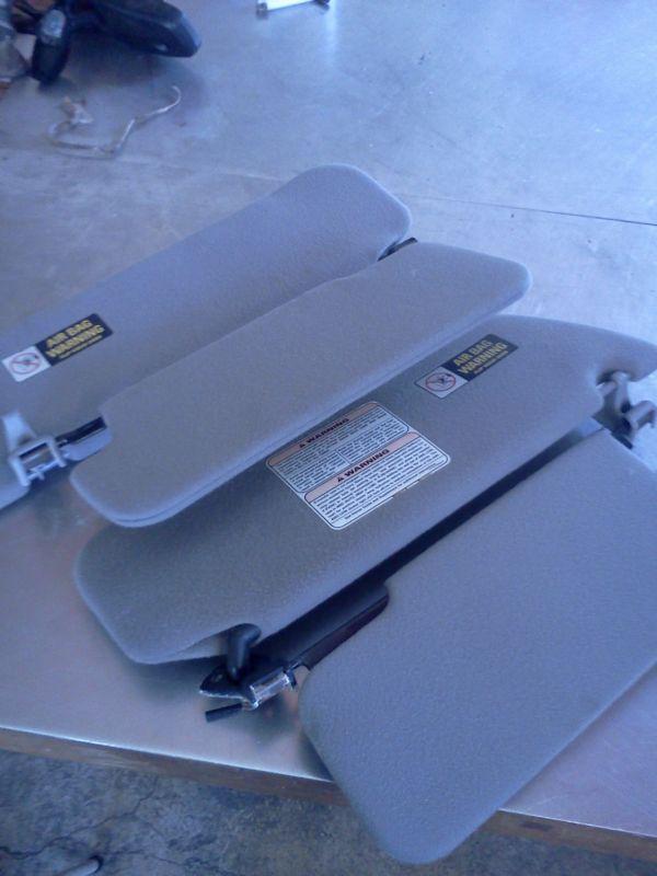 1997 ford explorer sun visors left and right  good shape,, clips included