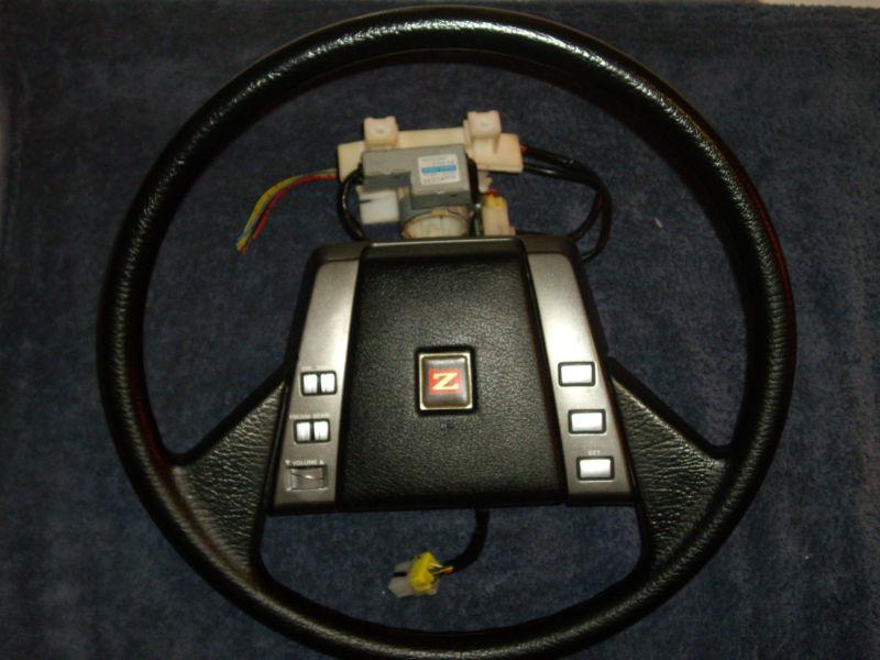 Early nissan 300zx steering wheel w/ radio controls & cruise buttons + extras