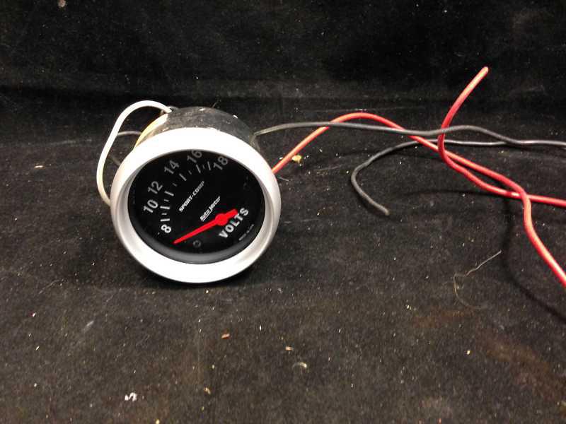 Auto meter products 2 1/2 " volt meter. new without box