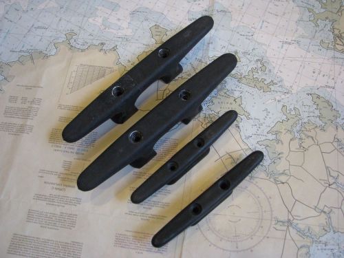 Four used black nylon boat/dock cleats: 2 at 10 inch, 2 at 6 1/2 inch