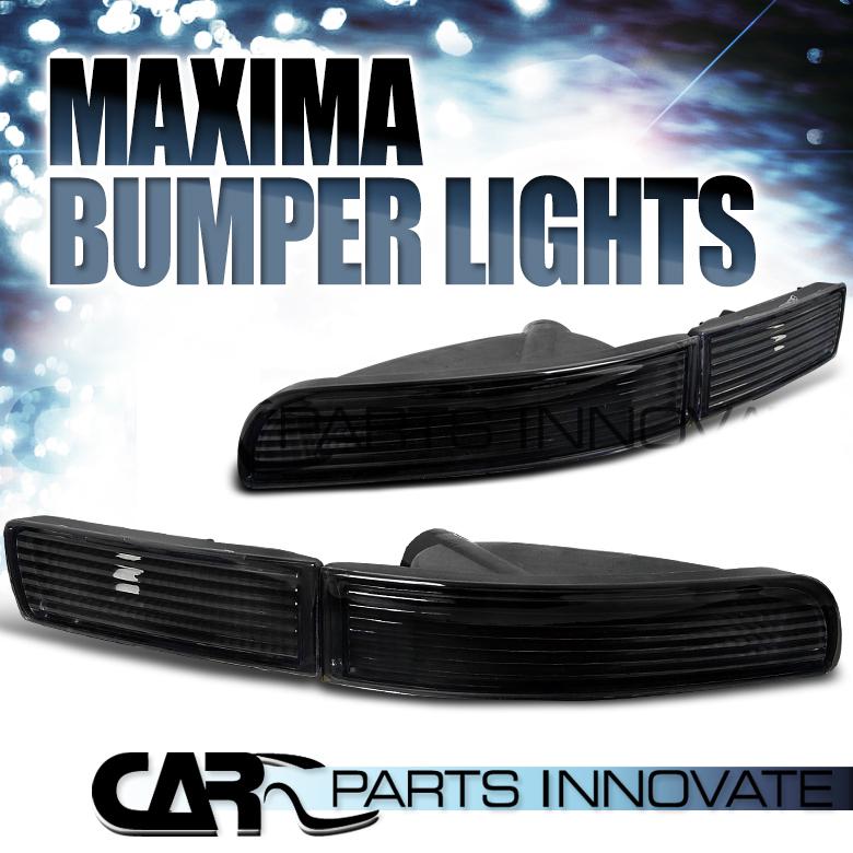 95-99 nissan maxima front bumper park lights black pair