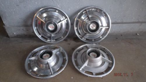 1964 chevrolet malibu ss factory hubcaps (4) 14&#034; as pictured. nice used
