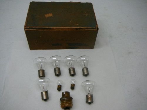 Various vintage auto 6-8 volt lamps and box