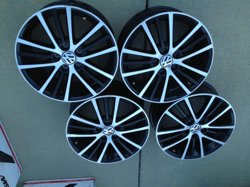 Vw golf mk6 17 inch onyx wheels ( black and silver)