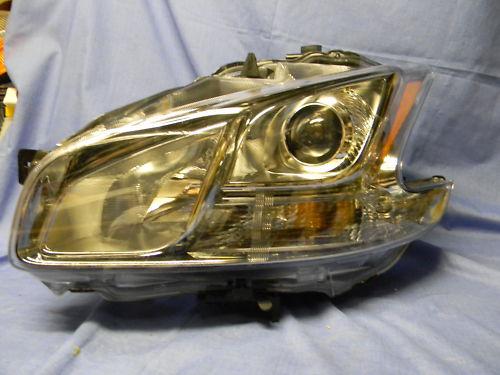 09 10 nissan maxima xenon head light l 1 repaired tab **sold with warranty*  r25