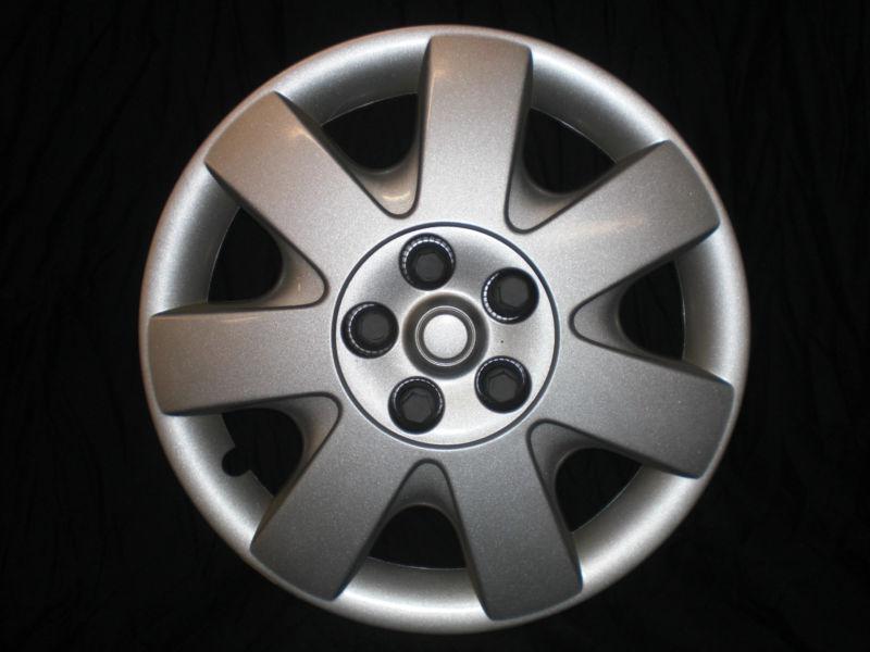 2005 ford taurus hub cap / wheel cover (7 spoke, smooth spokes)