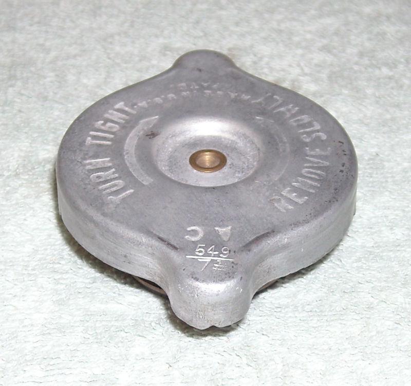 A very nice used radiator cap ac 549 7# for 1955-1960 corvette, without rc-1