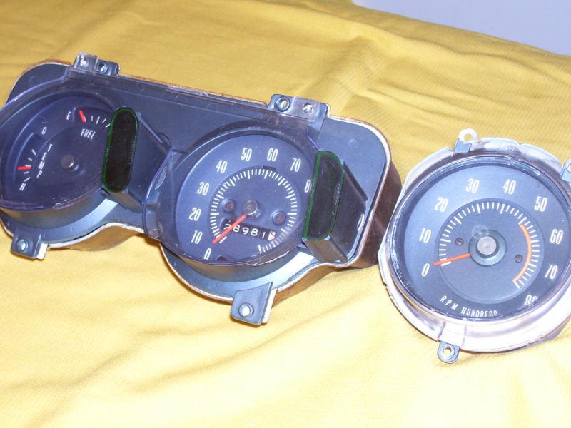 60s pontiac gto = rally dash gauges cluster set w/ tach = originals,hurst ramair