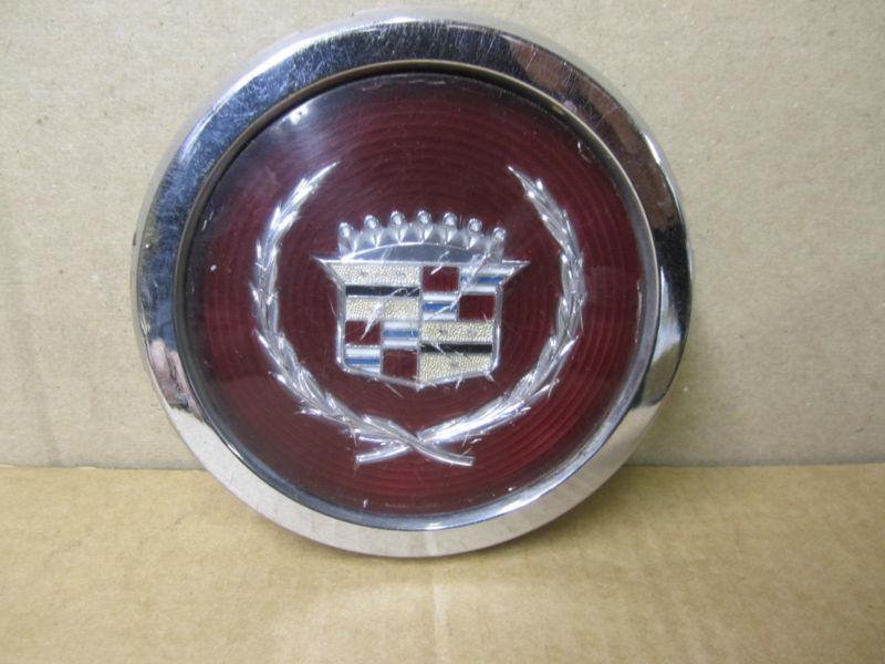 Cadillac original equipment wheel center cap red w/ chrome emblem