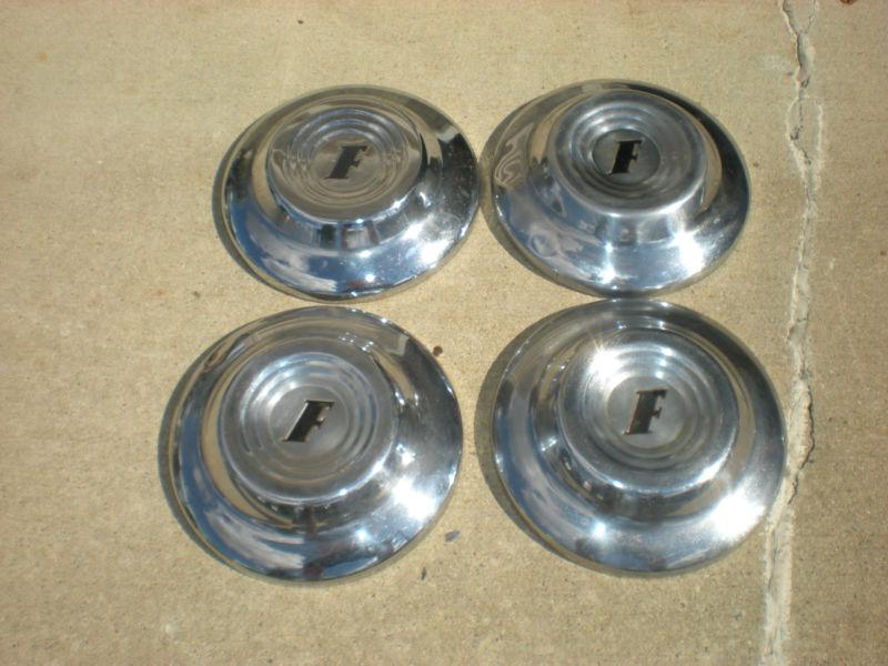 Original set four ford "shoebox" poverty caps/dog dish black f in center fomoco