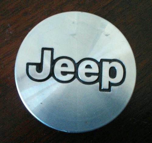 1999-2004 jeep grand cherokee /wrangler oem wheel cap cover