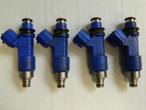 Subaru impreza wrx sti top feed injector set (4) oem blue 560cc denso