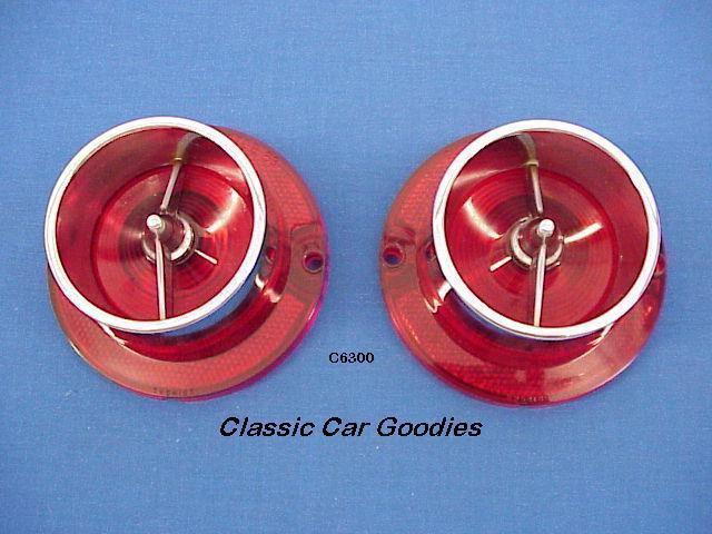 1963 chevy tail light lens (2) with chrome bezels. brand new!