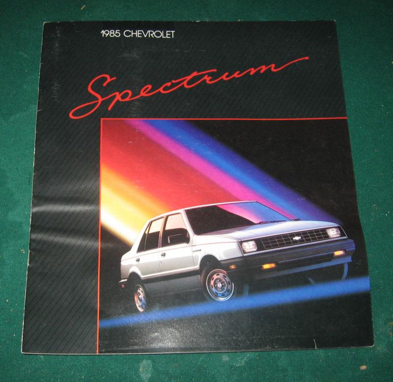 1985 chevy spectrum sales brochure; sedan; hatchback coupe; 16 pgs