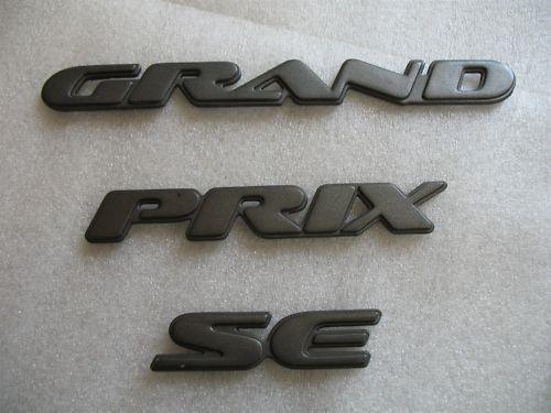2001 pontiac grand prix se rear side trunk logo emblem 00 01 02
