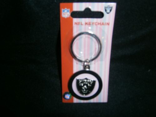 2 nfl raiders key chains  silver metal with pink- nice! free shipping