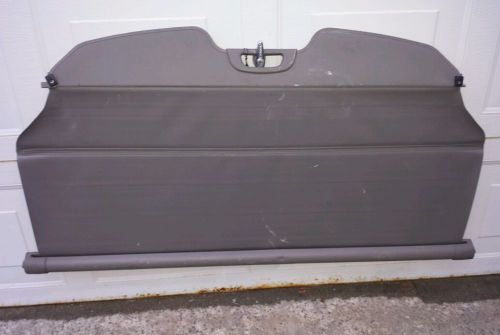 Cargo cover from 2002 saturn wagon l series. grey, used condition