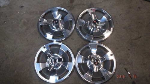 Used hubcaps 1966 corvette set of 4 excellent driver quality with spinners