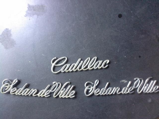 Cadillac deville emblems