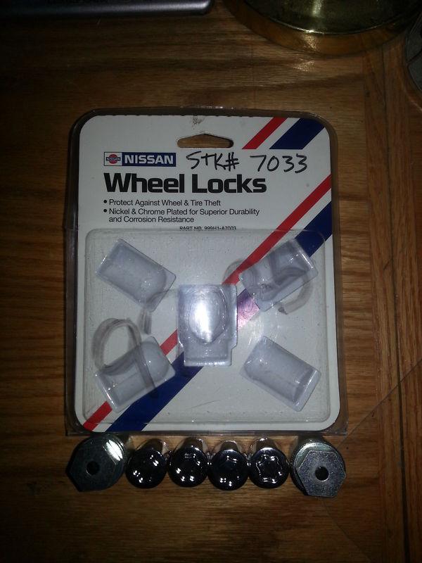 Genuine nissan wheel locks 999h1-a7003 with two keys --see compatibility below