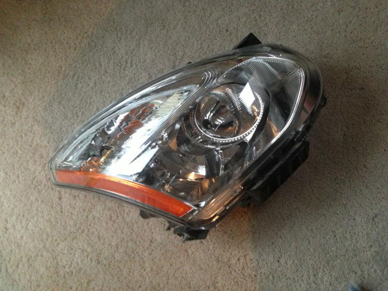 Oem 2008-2012 nissan rogue right side headlight xenon used 