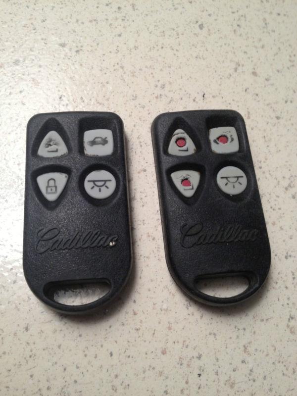  pair of oem 93-95 cadillac seville eldorado keyless remote key fob entry